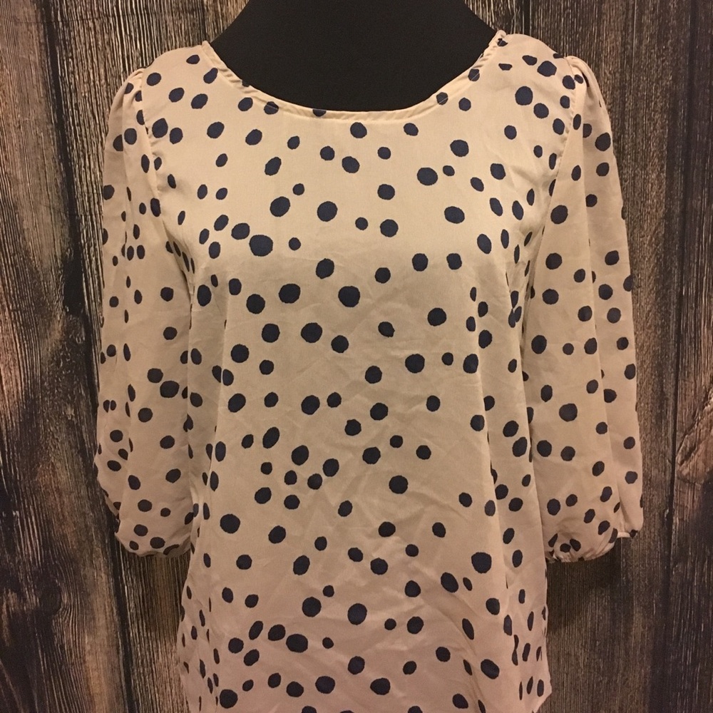 Cream with navy polka dots
